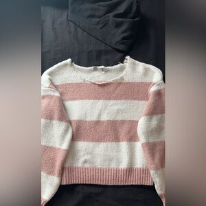 This is a xs sweater from hollister white and light pink
